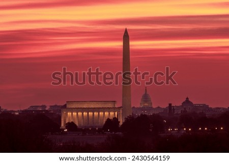 Washington DC skyline during sunrise, the image includes Lincoln Memorial, Washington Monument, and The United States Capitol building.