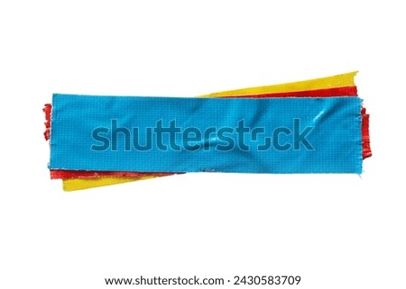 Layered blue, red and yellow cloth tapes isolated on white background with clipping path