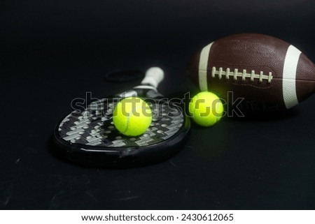 Sports equipment, rackets and balls on black background. Horizontal education and sport poster, greeting cards, headers, website