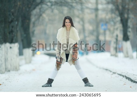 funny winter pictures running and jumping girl