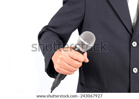 Business man holding a microphone isolated on white background