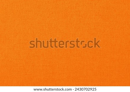Orange fabric cloth texture for background, natural textile pattern. Royalty-Free Stock Photo #2430702925