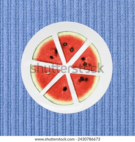 Fresh watermelon slices arranged on a white plate, vibrant hues contrast against the clean background, promising a refreshing summer treat. #watermelon 🍉