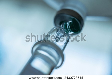 Close up medical intravenous IV drip in hospital background