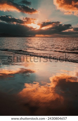 sunsets of las canteras beach Royalty-Free Stock Photo #2430804657