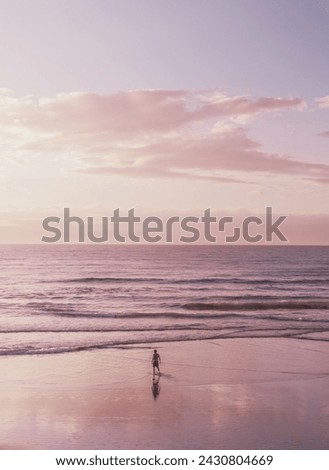 sunsets of las canteras beach Royalty-Free Stock Photo #2430804669