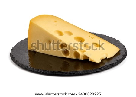Traditional Maasdam cheese, isolated on white background. High resolution image.