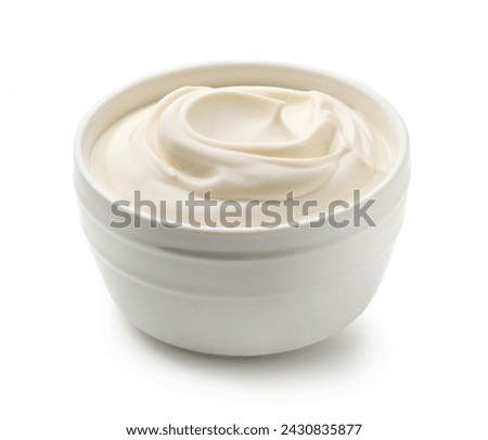 bowl of sour cream isolated on white background
