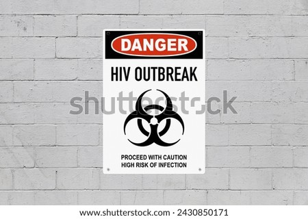 Black, red and white danger sign attached on a brick wall painted in grey. The sign stating “Danger - HIV outbreak - Proceed with caution, high risk of infection”.