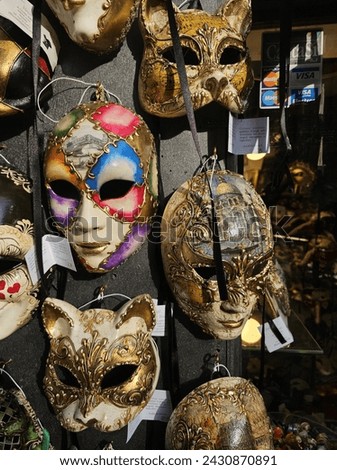 24 December 2023, Venice Italy Venetian 
masks depicting human and animal faces Royalty-Free Stock Photo #2430870891