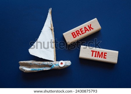 Break Time symbol. Concept word Break Time on wooden blocks. Beautiful deep blue background with boat. Business and Break Time concept. Copy space