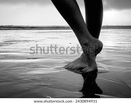 Black and White feet at the beach