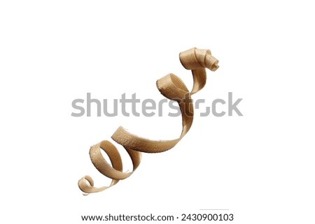 Wood shavings naturally curled after a tool on a white background. Royalty-Free Stock Photo #2430900103