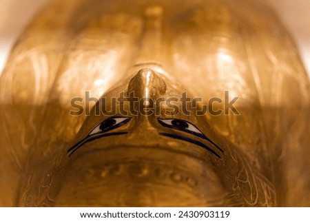 Cairo, Egypt - February 17,2024: Golden coffin of Nedjemankh at the National Museum of Egyptian Civilization in Cairo. Royalty-Free Stock Photo #2430903119