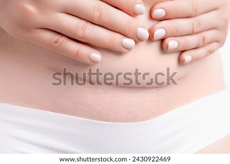 Woman belly with a big scar from a cesarean section. 