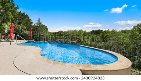 a home back yard with a pool 