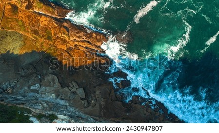 Stunning ocean view of the waves and rock pool in the Northern Beaches of NSW, Sydney, Australia. The view was captured from above using a drone. Dee Why