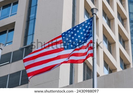 American flag and Modern buildings in the metropolis.