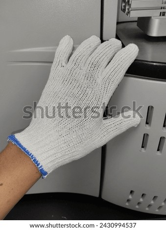 Wear cotton gloves when working for safety