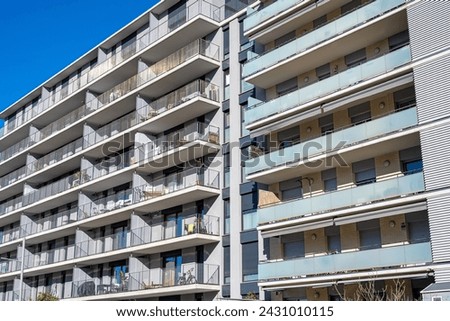The facade of some modern apartment buildings seen in Badalona, Spain Royalty-Free Stock Photo #2431010115