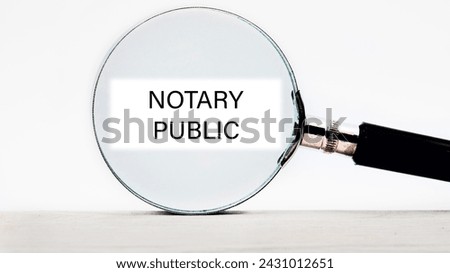 NOTARY PUBLIC is written through a magnifying glass