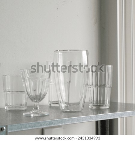 different kinds of glass on a shelf