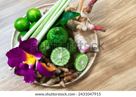 Thai Spa massage compress balls, herbal ball and treatment spa, relax and healthy care with flower, Thailand. Healthy Concept. Royalty-Free Stock Photo #2431047915