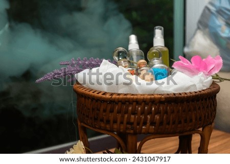 Thai Spa massage compress balls, herbal ball and treatment spa, relax and healthy care with flower, Thailand. Healthy Concept. Royalty-Free Stock Photo #2431047917