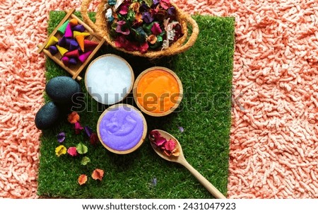 Thai Spa massage compress balls, herbal ball and treatment spa, relax and healthy care with flower, Thailand. Healthy Concept. Royalty-Free Stock Photo #2431047923