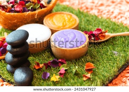 Thai Spa massage compress balls, herbal ball and treatment spa, relax and healthy care with flower, Thailand. Healthy Concept. Royalty-Free Stock Photo #2431047927