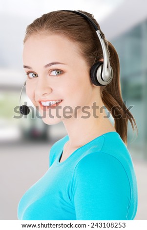 Friendly call center assistant smiling