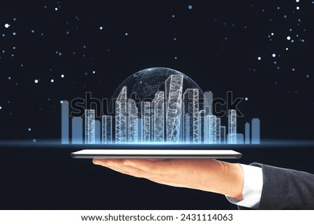 Holographic projection of a cityscape on a tablet held by a businessman against a starry night background
