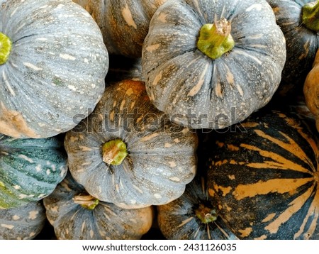 Stack of pumpkins at market 