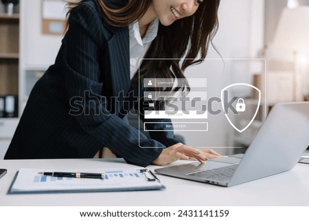 Businessman typing login and password in the concept of cyber security, information security, data protection, and encryption for secure access to user's personal information.