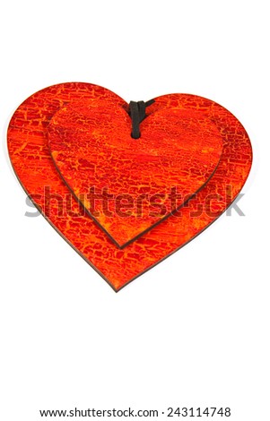 Wooden heart painted in red with peeling texture in vintage style