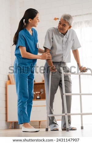 Asian physiotherapist nursing home to support old senior man patient therapy by walker, caregiver nurse help recovery health care with elderly retirement man person at home, health insurance concept