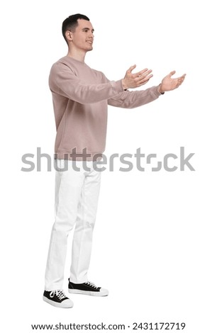 Full length portrait of handsome young man on white background