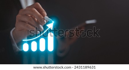 Business growth, progress or success concept, Business development to success, Businessman pointing on bar graph corporate future growth plan.