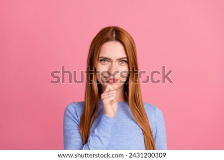 Portrait of smart confident girl with red foxy hairdo wear blue pullover think ideas hold finger on chin isolated on pink color background Royalty-Free Stock Photo #2431200309