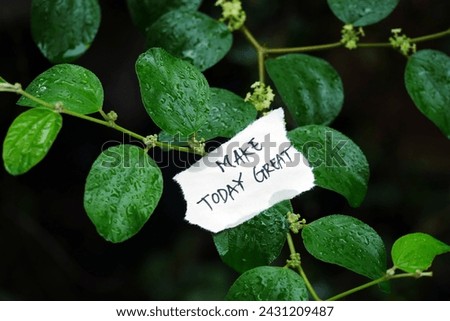Inspirational Typography Quote on torn paper with the words "Make Today Great" on a tree branch, motivational typography.