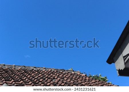 Clear blue sky in a residential area
