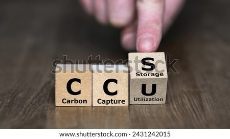 Cubes form the expression CCU (carbon capture utilization) and CCS (carbon capture storage). Royalty-Free Stock Photo #2431242015