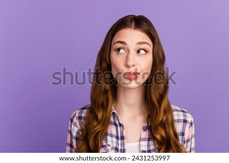 Photo of lady looking up empty space deep thinking creative wear casual outfit isolated shine color background.
