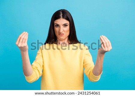 Young beautiful caucasian girl over isolated blue background angry gesturing typical italian gesture with hand, looking to camera. Royalty-Free Stock Photo #2431254061