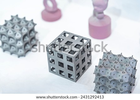 Metal products made by metal 3D printing. Modern additive technology. Royalty-Free Stock Photo #2431292413