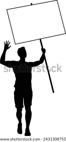Protestor or demonstrator at a demonstration march, picket line or strike protest rally in silhouette. Holding up a banner or picket sign board placard. Royalty-Free Stock Photo #2431308755
