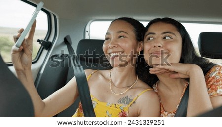 Woman, friends and selfie on road trip with smile, tongue and funny face with adventure in car. Girl, photography and kiss with care, journey or holiday with memory, profile picture or transportation