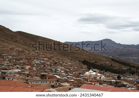Urban area of Potosí extending over the hill that surrounds the city. Royalty-Free Stock Photo #2431340467