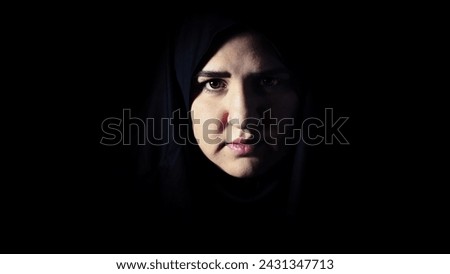 Religious Young muslim woman in prayer outfit