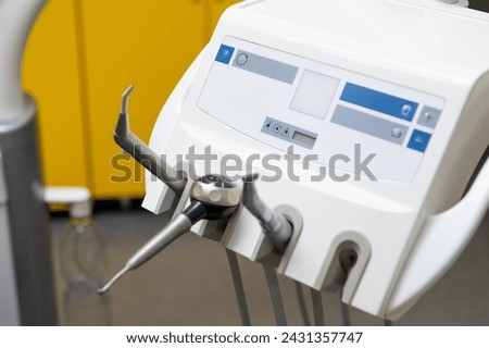 Dentist tools, burnishers, different dental instruments in a dentists office Royalty-Free Stock Photo #2431357747